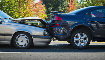 Two damaged cars after a collision